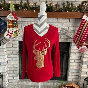 Christmas red top with gold reindeer.